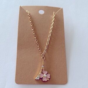 Golden Plated crystal Eiffel Tower, pink Four leaf clover necklace.
